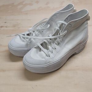 Chunky white Adidas high tops some scuffing and wear but almost none. Nearly new